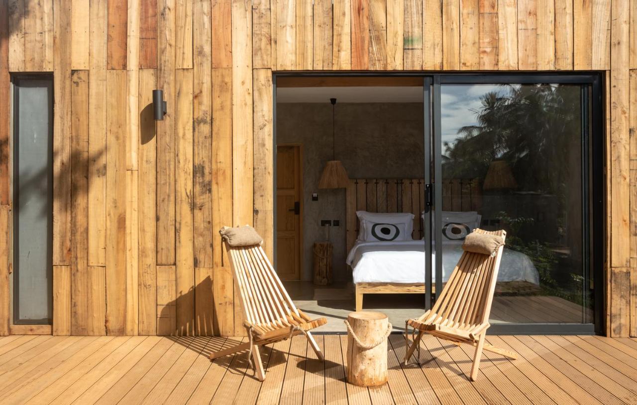 Lalagalu - Beachfront Ecocabins เดียนีบีช ภายนอก รูปภาพ
